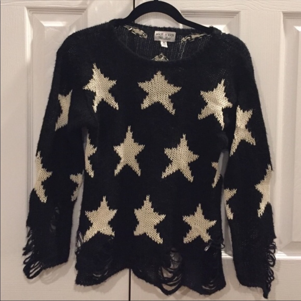 Distressed star sweater